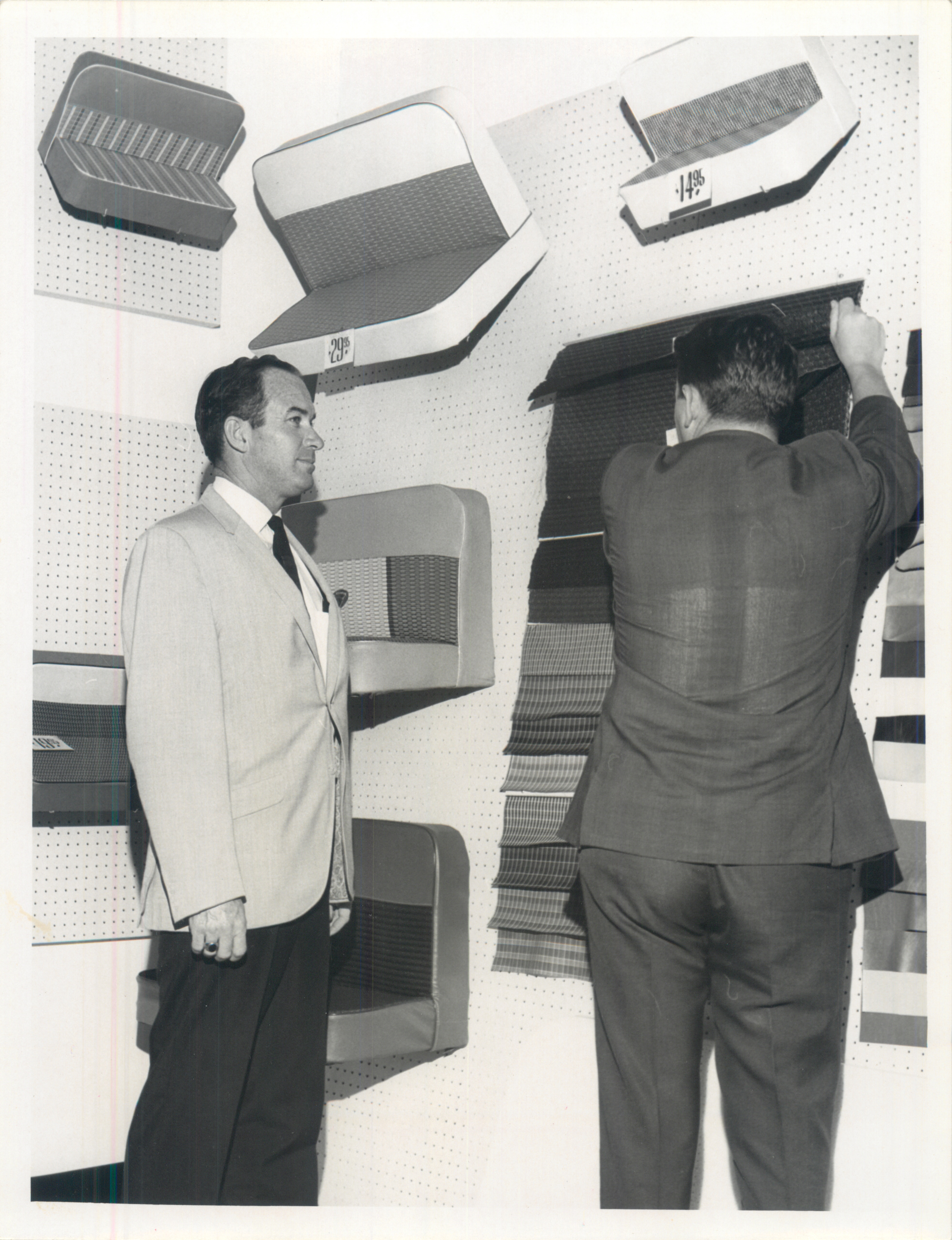 Browsing seat cover samples in the showroom