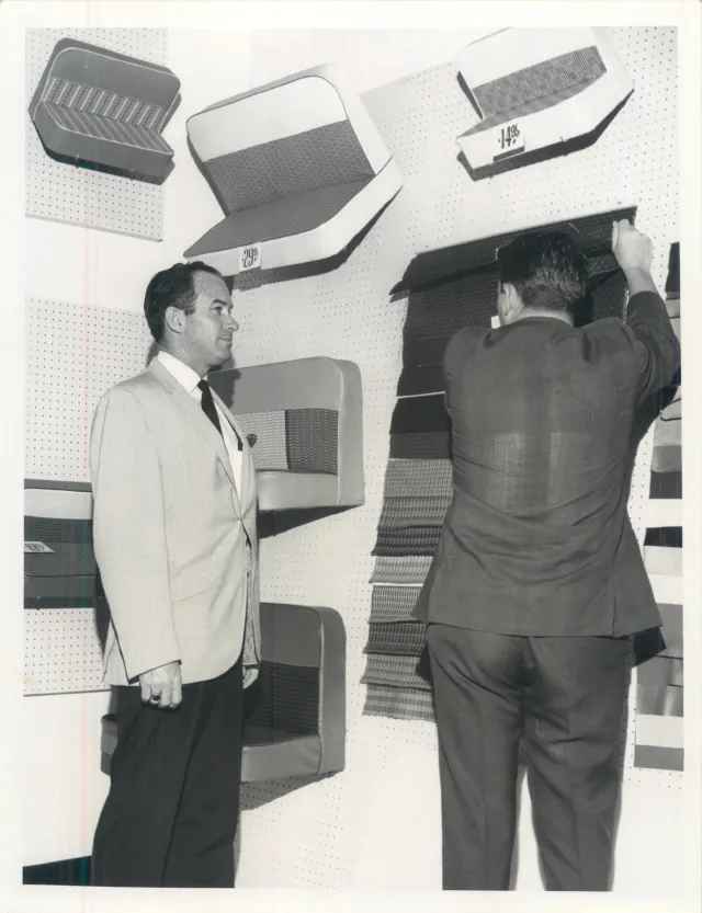 Browsing seat cover samples in the showroom