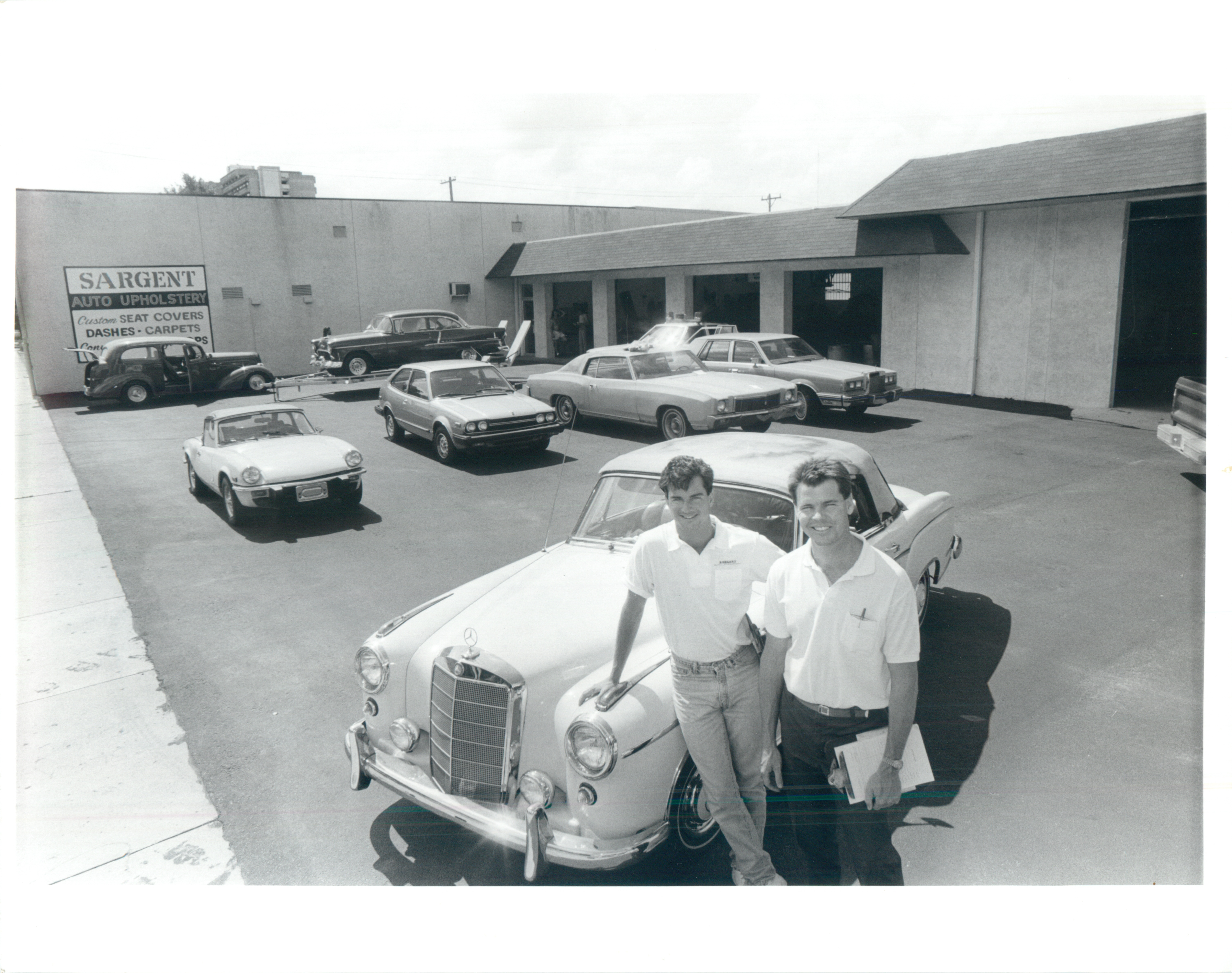 Classic cars outside Sargent Upholstery